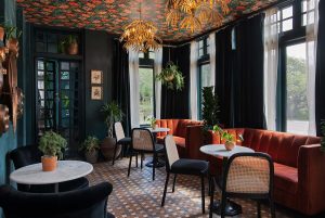 west-house-austin-ceiling-wallpaper-spoonflower-le-jardin-art-nouveau-commercial-wallpaper-installation-by-paper-moon-painting