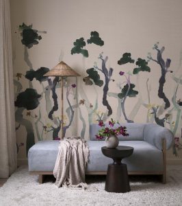 work-and-sea-grasscloth-with-painted-trees-in-bedroom-sitting-area-by-tribe-design-ryann-ford-photo