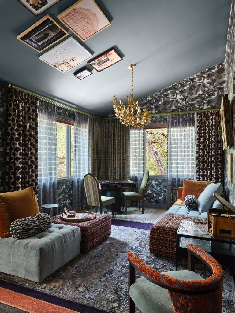 Harlequin "Grounded" wallpaper in game room lounge, design by Rhydima Brar