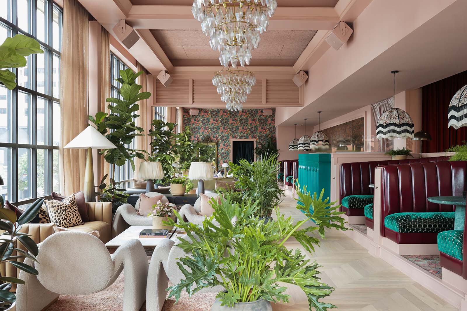 lounge-area-with-wallpaper-on-back-wall-at-estelles-austin-tx-paper-moon-wallpaper-specialists