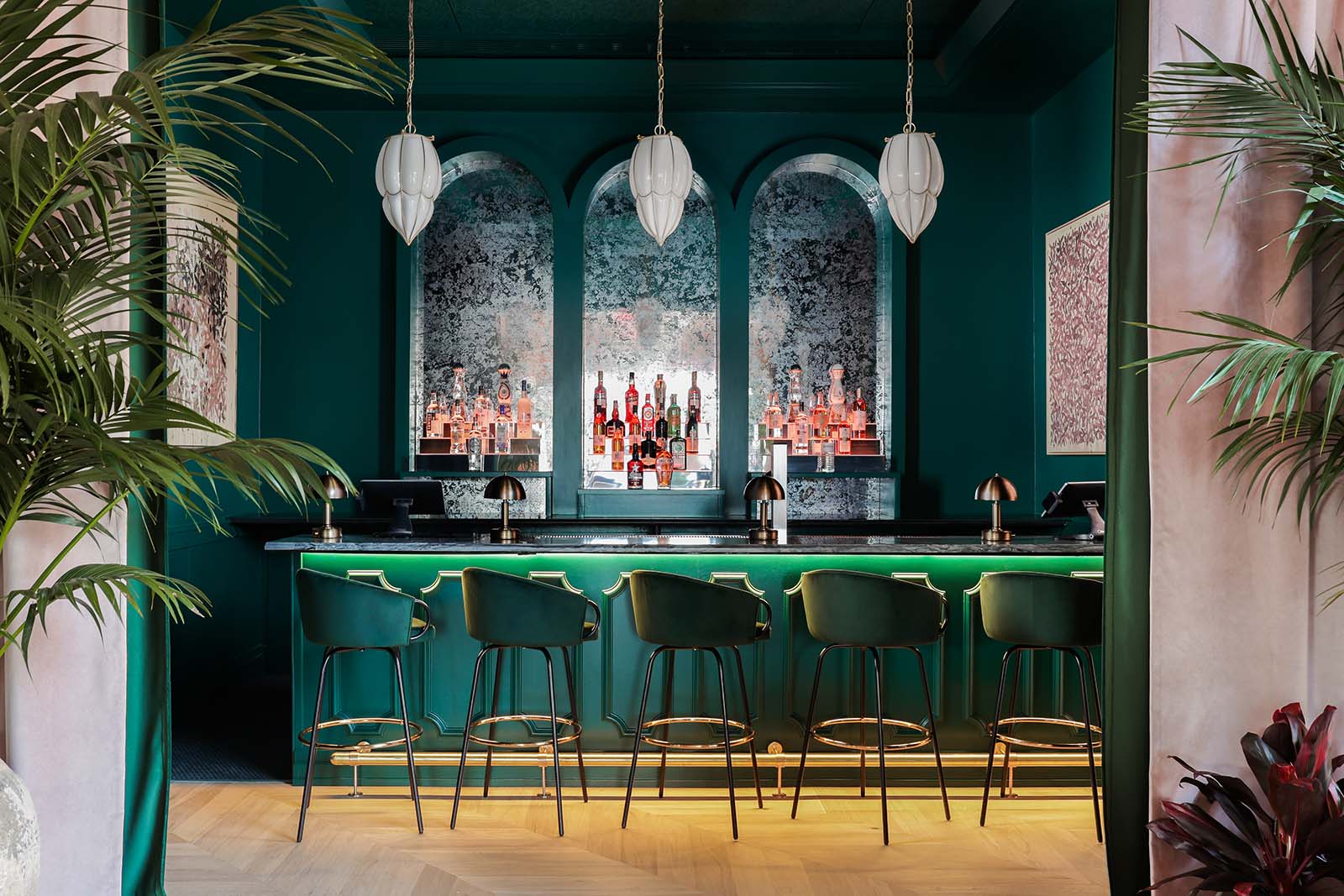 Mirror wallpaper behind bar at Estelle's Austin Tx, Paper Moon Wallpaper Specialists