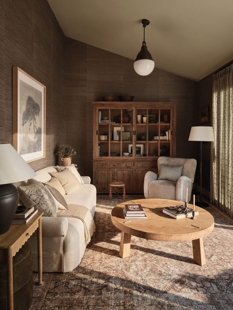 Secondary living area, or "she shed" space, with "Juicy Jute" grasscloth, designed by Amber Lewis.