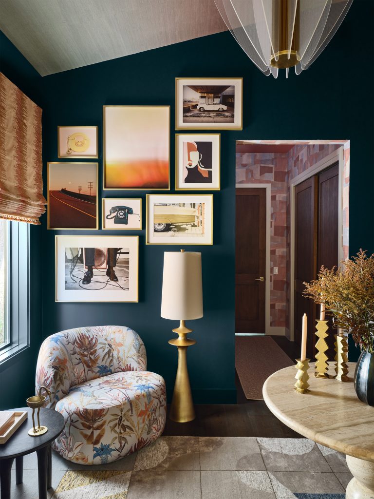 Phillip Jeffries' "Mirage Sunbaked" wallpaper on ceiling in secondary living area designed by Amber Guyton