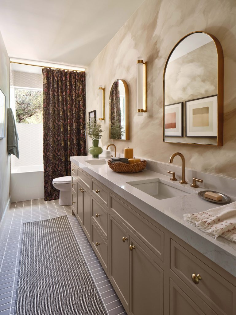 Harlequin "Air" in Golden Light wallpaper in primary bath, design by Sara Malek Barney