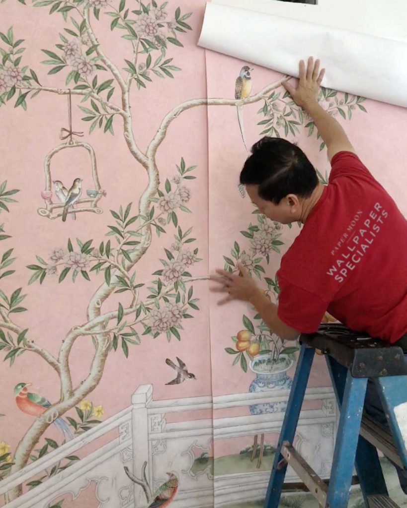 paper moon wallpaper installer hanging pink chinoiserie Gracie mural